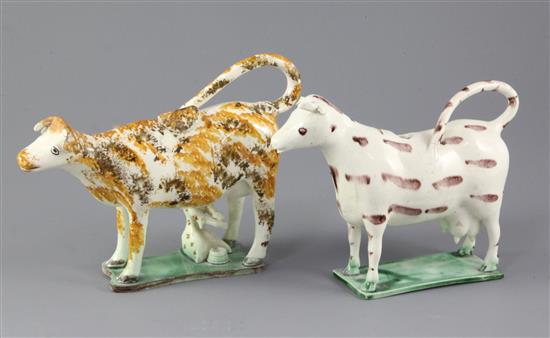 Two Yorkshire pearlware cow creamers, early 19th century, length 19.5 and 16.5cm, losses